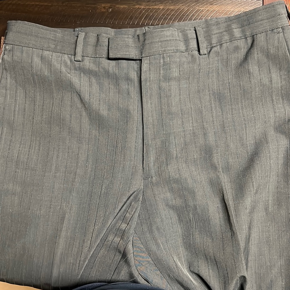Perry Ellis Portfolio, men’s dress pants, 100% polyester.